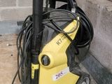 a yellow pressurer that is on the ground