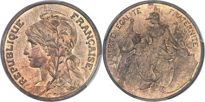 a close up of two pennys on a white background