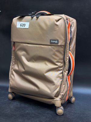 a piece of luggage that is sitting on the ground