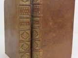 an old book with two pages that have been turned into a book