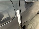 a close up of a car door with a sticker on it