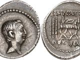 a silver coin with an image of a man on it