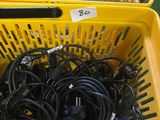 a basket full of electrical cords and wires in it