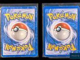 two packs of pokemon cards with a poke poke poke poke poke poke poke poke poke poke poke poke poke poke