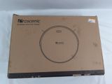 packaging of a box for a robotic vacuum cleaner on a white surface