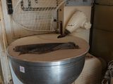 an image of a toilet in a room with a net over the seat