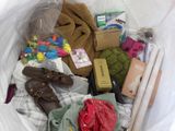 a bag full of clothes and other items in it
