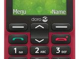 un téléphone portable rouge et noir avec un écran vert sur lequel apparaissent des chiffres