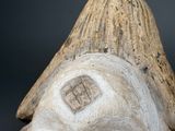 a close up of a carved head of a person
