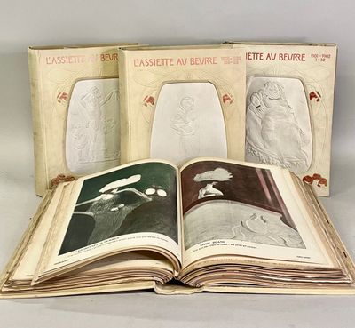 three books with pictures of people on them sitting on top of a table