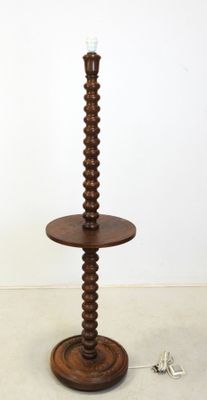 an image of a wooden table with a candle on it