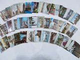 de nombreuses cartes postales sur un fond blanc