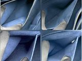 four pictures of a blue purse with a zipper open and a zipper open