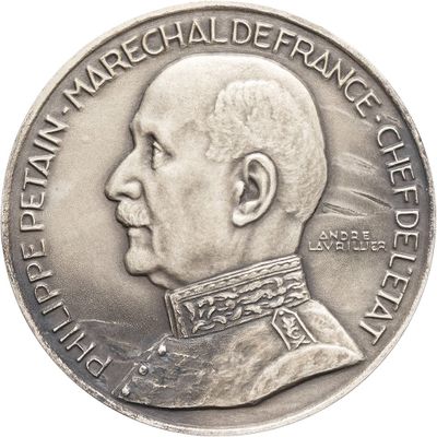 l'image d'une pièce d'argent sur laquelle figure le portrait d'un homme