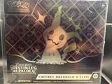 a box with a pokemon figure inside of it on a table