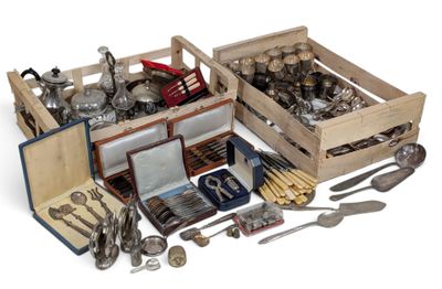 many different types of silverware in a wooden box