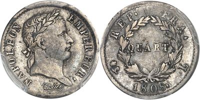 a silver coin with an image of a woman on it