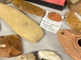 many different types of rocks and stones on the table