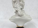 an image of a statue of a man with a beard on top of a marble bust