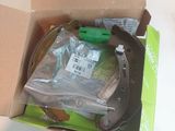 a cardboard box with a pair of shoes inside of it