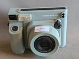 a small camera that is sitting on a table