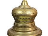 an image of a gold plate with a bird on top