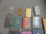 many books that are sitting on the floor together