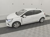 the white car is parked in the garage on the checkered floor