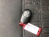 a car key with a price tag attached to it