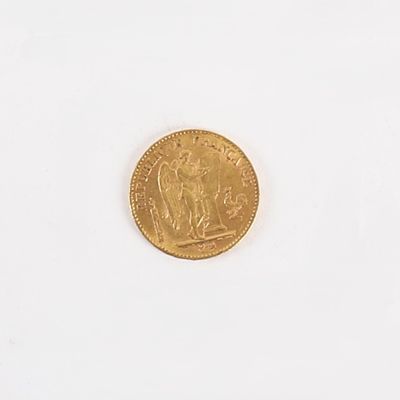 une pièce d'or portant l'image d'un homme et d'une femme