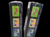 two boxes of incense sitting next to each other on a black background