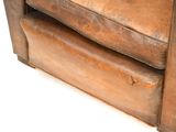 an image of a brown leather chair on a white background