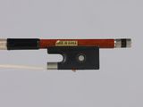 a close up of a violin bow on a white background