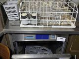 a dishwasher that is sitting inside of a dishwasher