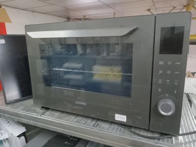 an image of a microwave on a shelf in a store