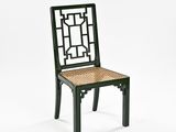 an image of a black chair with a woven seat and back