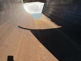 a shadow of a person on a skateboard on a ramp