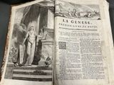an open book with a picture of a woman on it