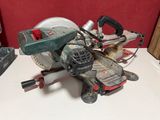 a picture of a small circular saw on a table