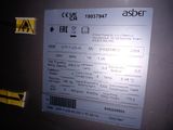 a label on the back of a machine that has a warning sticker on it