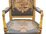 an image of a chair with a blue and gold upholstered back