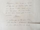 an old letter written in french on a piece of paper