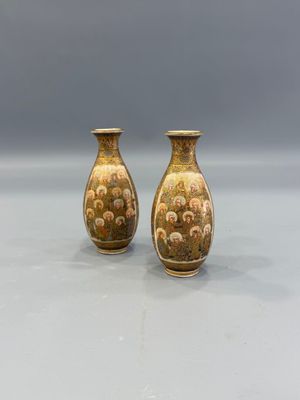 pair of antique japanese vases with gold and red designs