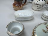 a white table topped with different types of decorative items