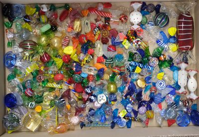 a box full of assorted christmas ornaments in it