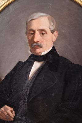 portrait of an old man in a black coat and white shirt