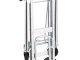 a close up of a hand truck with wheels on a white background