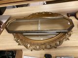 a mirror that is sitting on top of a table
