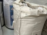 a lot of bags that are sitting on a shelf