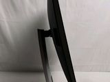 a close up of a computer monitor on a stand on a white background
